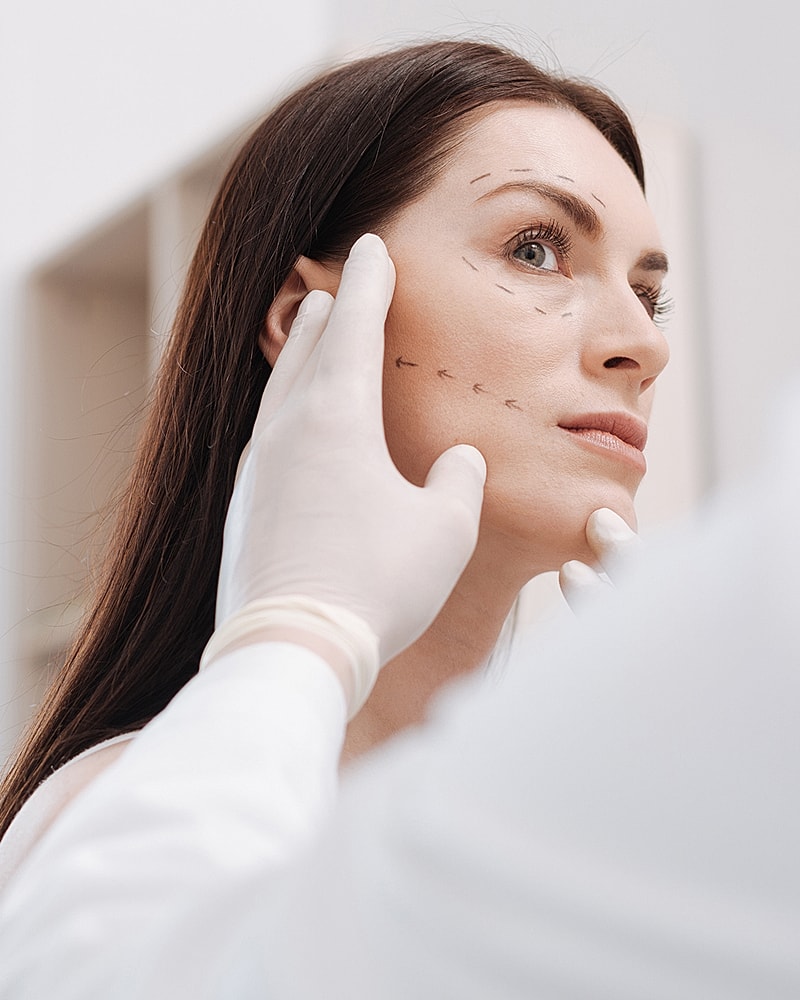 Consultation for facial cosmetic surgery preparation.