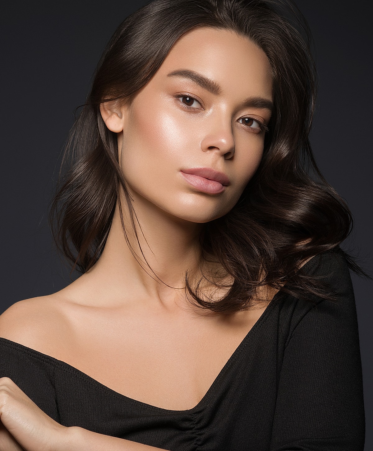 Portrait of a woman with soft, natural beauty.